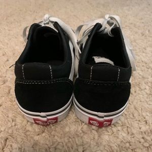 Black and white skater vans